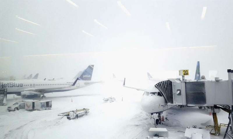 JetBlue airplanes wait at the gates outside terminal five at John F. Kennedy International Airport on January 4, 2018 in the Queens borough of New York City. 