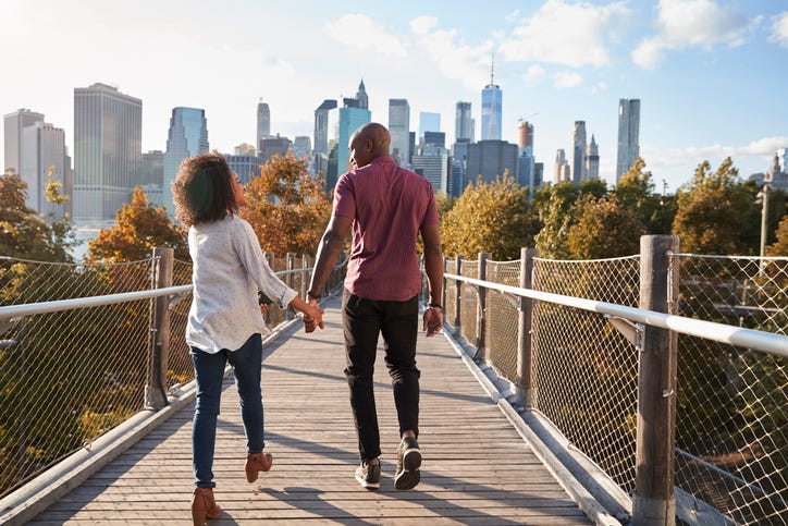 Couple Walking In The City