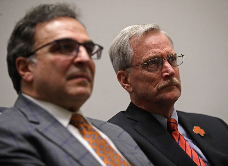 President and CEO Ted Phillips (L) and chairman George McCaskey listen to new head coach Matt Nagy during an introductory press conference at Halas Hall on January 9, 2018 in Lake Forest, Illinois.