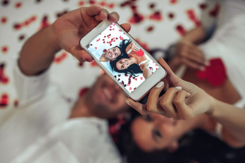 A couple taking a selfie