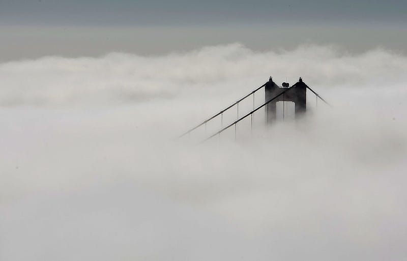 The south tower of the Golden Gate Bridge peeks out from a blanket of fog September 21, 2009 in the Marin Headlands of Sausalito, California.