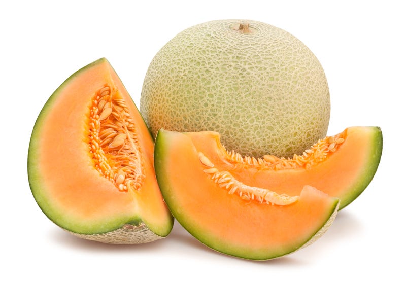 Cantaloupe, cut and whole.