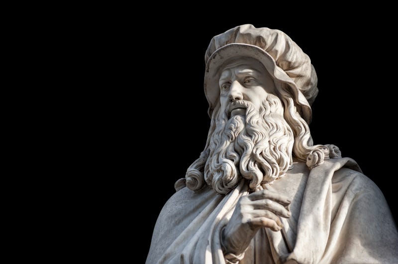 Florence, Italy - December 22, 2017: Leonardo Da Vinci statue, by Luigi Pampaloni, 1839. It is located in the Uffizi courtyard, in Florence.
