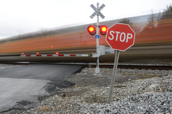 One women is dead after her vehicle was struck by a train at a railroad crossing in Milford Wednesday morning.
