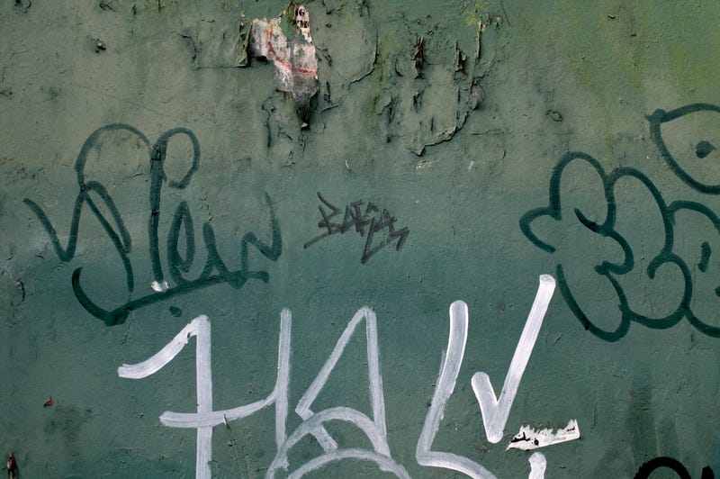 The young girl was allegedly tagging the bar's parklet.