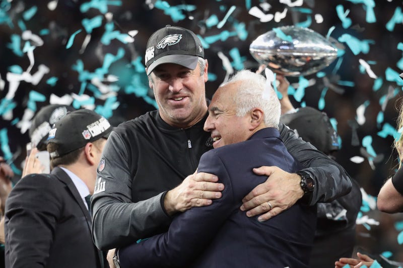 Doug Pederson hugs Jeffrey Lurie