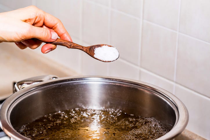 Adding Salt To Boiling Water