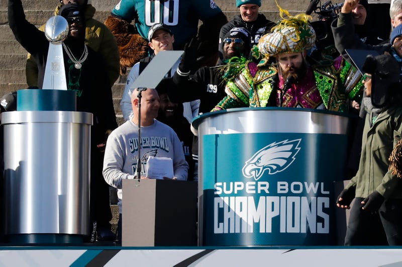 Center Jason Kelce, wearing a Mummers outfit, speaks at a ceremony honoring the Philadelphia Eagles Super Bowl win on February 8, 2018 in Philadelphia, Pennsylvania.