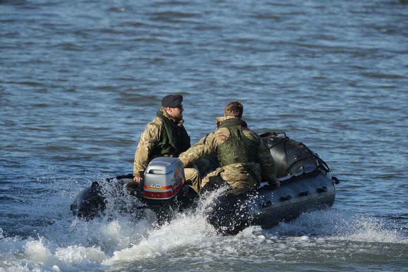 A Royal Navy bomb disposal team investigate George V Dock after an unexploded 500kg World War Two bomb was found in the River Thames on February 12, 2018 in London, England. The bomb was discovered on Sunday during scheduled work and a 214-metre exclusion zone was established whilst it was removed, forcing London City Airport to cancel all flights. (Photo by Dan Kitwood/Getty Images)