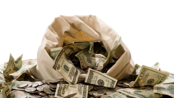 Family Goes for a Drive, Finds $1 Million in Cash Lying in Middle of the Road