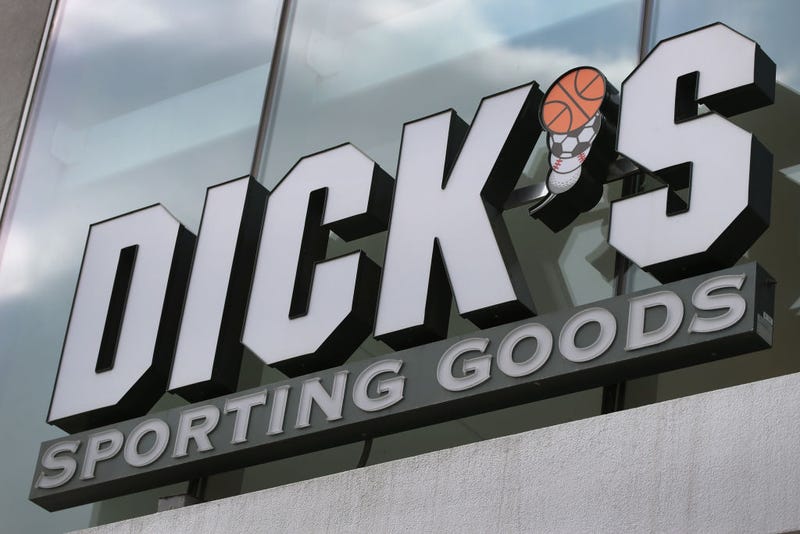A sign hangs outside of a Dick's Sporting Goods store on February 28, 2018 