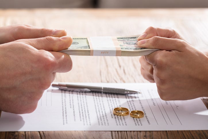 Couple Fighting Over Money During Divorce Hearing
