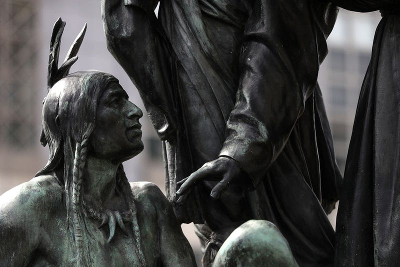 A statue known as "Early Days" that depicts a Native American at the feet of a Catholic missionary and Spanish cowboy stands on Fulton Street as part of the Pioneer Monument on March 12, 2018 in San Francisco, California.