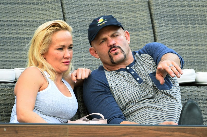 Retired mixed martial artist and former UFC Light Heavyweight Champion Chuck Liddell and his wife, poker player Heidi Northcott, attend the tennis match between Sloane Stephens of the United States and Daria Kasatkina of Russia during Day 8 of BNP Paribas Open on March 12, 2018 in Indian Wells, California.
