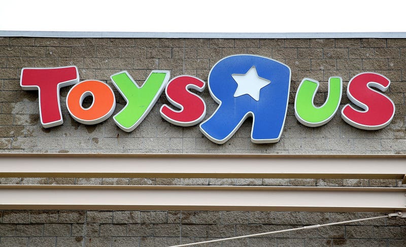 The Toys R Us logo is displayed on the exterior of a store on March 15, 2018 in Emeryville, California. Toys R Us filed for liquidation in a U.S. Bankruptcy court and plans to close 735 stores leaving 33,000 workers without employment. (Photo by Justin Sullivan/Getty Images)