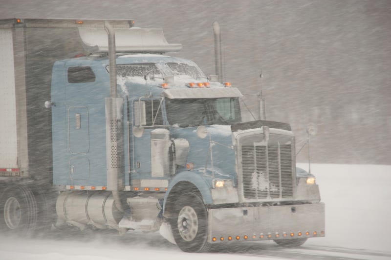 Semi in whiteout snow storm