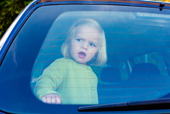 child in car