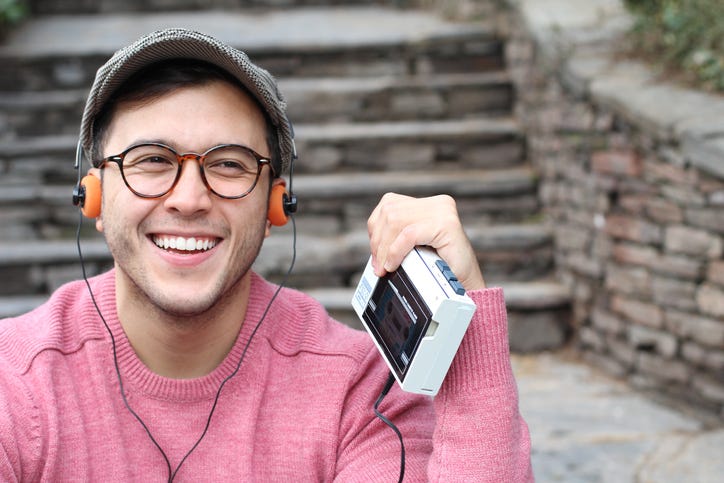 Man Listening To A Walkman