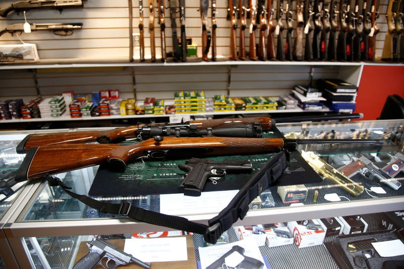 A Remington 700 hunting rifle, a Remington 1100 shotgun and a Remington R1 Enhanced model 1911 pistol are seen for sale at Atlantic Outdoors gun shop on March 26, 2018 in Stokesdale, North Carolina. Founded in 1816, Remington is one of America's oldest gun and ammunition manufacturers which now has filed for Chapter 11 bankruptcy protection partially due to an estimated $950 million in debt. (Photo by Brian Blanco/Getty Images)