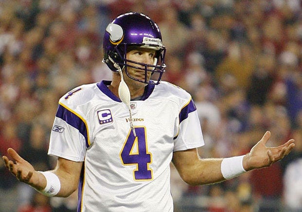 Brett Favre shrugs in reaction to a play with the Vikings.