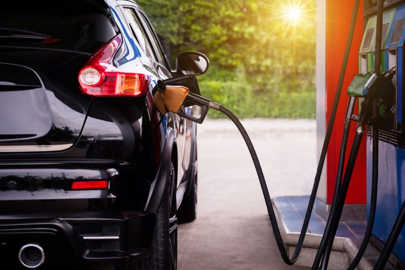 Pumping gasoline fuel in car