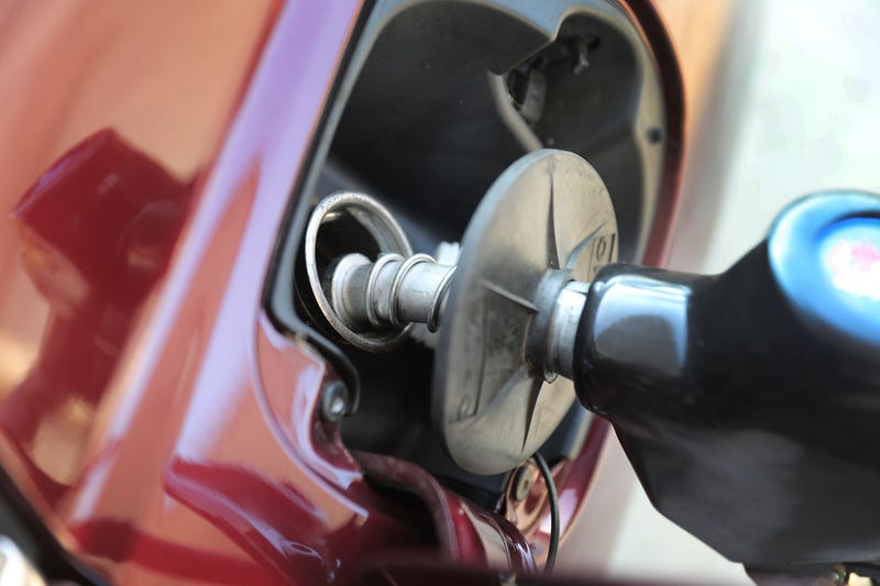pumping gas into car