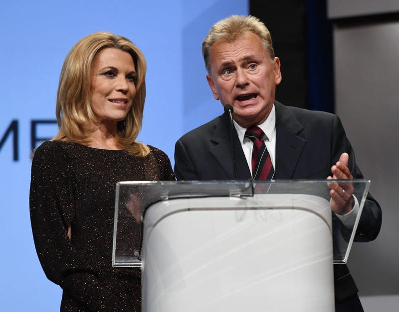 Wheel of Fortune" hostess Vanna White (L) and host Pat Sajak speak as they are inducted into the National Association of Broadcasters Broadcasting Hall of Fame during the NAB Achievement in Broadcasting Dinner at Encore Las Vegas on April 9, 2018