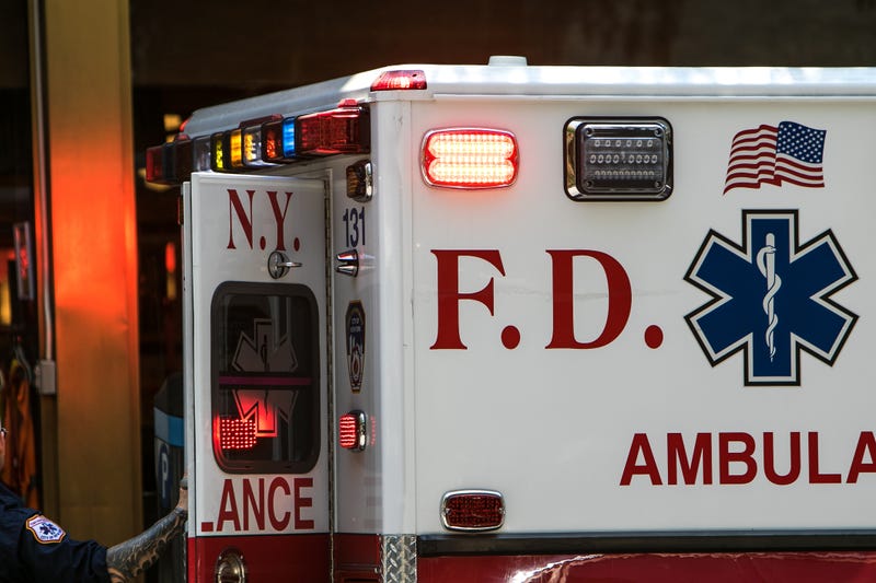 A man died while in the hospital in police custody Friday after he headbutted an EMT who tried to treat his injuries.