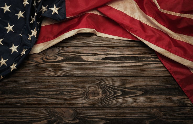 An American flag on a table. 
