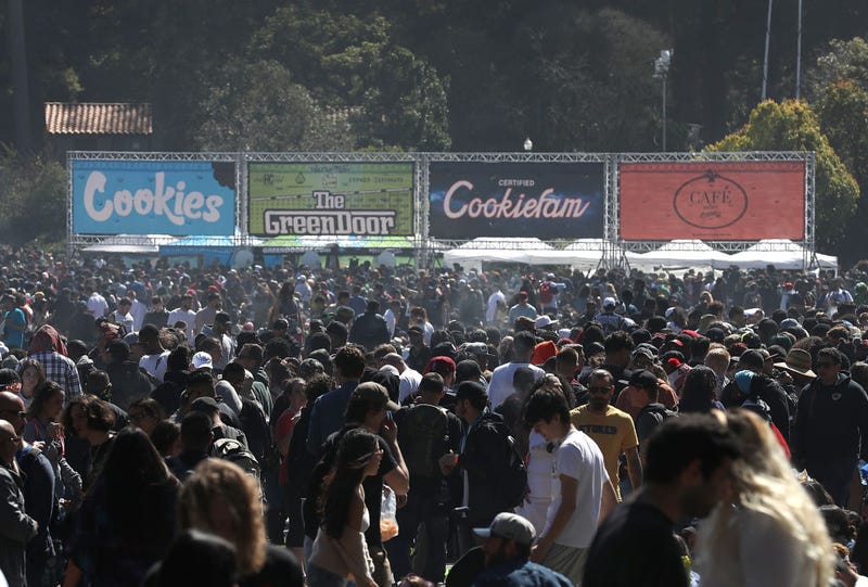 A cloud of marijuana smoke hangs over a crowd of people during a 420 Day celebration on 'Hippie Hill' in Golden Gate Park on April 20, 2018 in San Francisco, California. In the first year that marijuana is legal for recreational use in California, thousands of marijuana enthusiasts gathered in Golden Gate Park to celebrate 420 day, the de facto holiday for marijuana advocates, with large gatherings and 'smoke outs' in many parts of the United States. (Photo by Justin Sullivan/Getty Images)