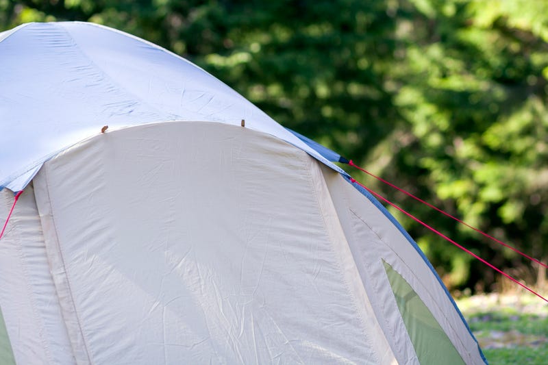 Close-up view of part of a tourist tent. Hikers camp detail.