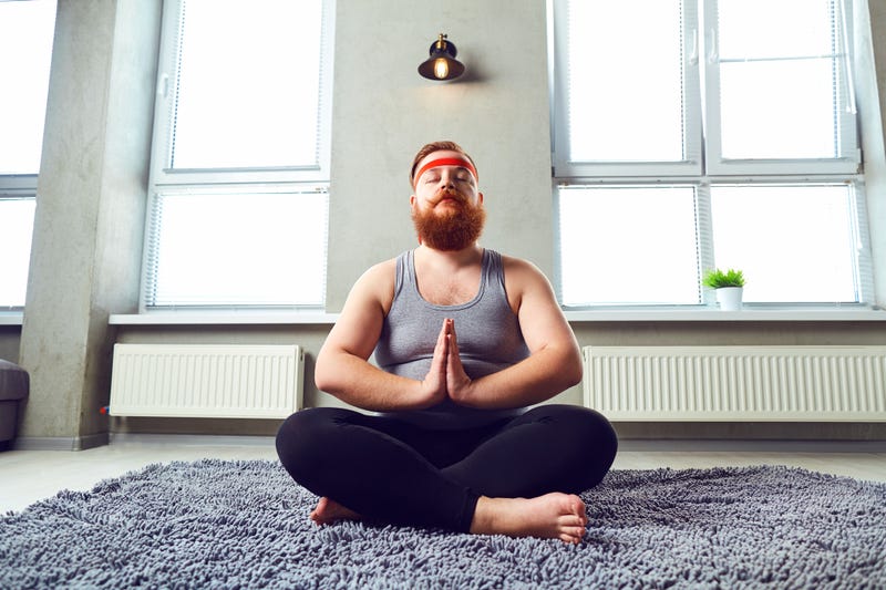 Big guy doing yoga