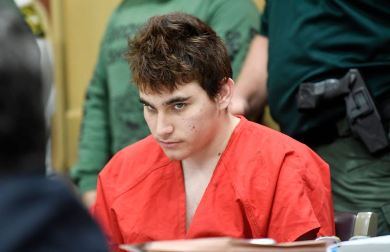 Florida school shooting suspect Nikolas Cruz quickly glances up at the prosecutors during a hearing on April 27, 2018, in Fort Lauderdale, Florida.