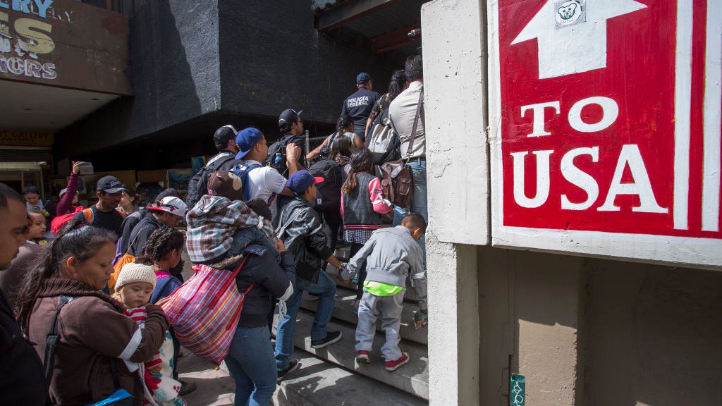 Biden's plan to terminate Trump-era 'Remain in Mexico' policy temporarily blocked by judge