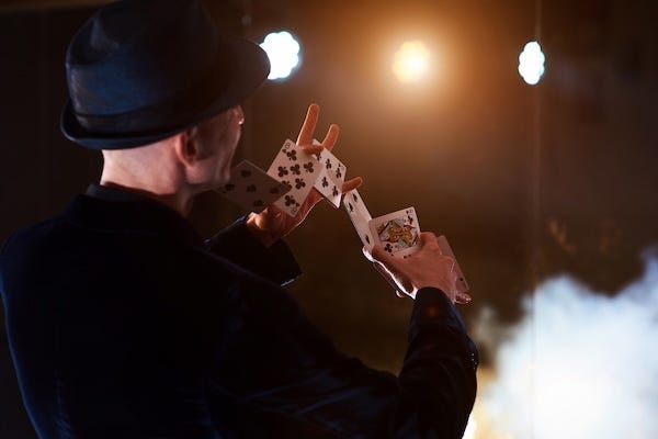 Magician performing a card trick