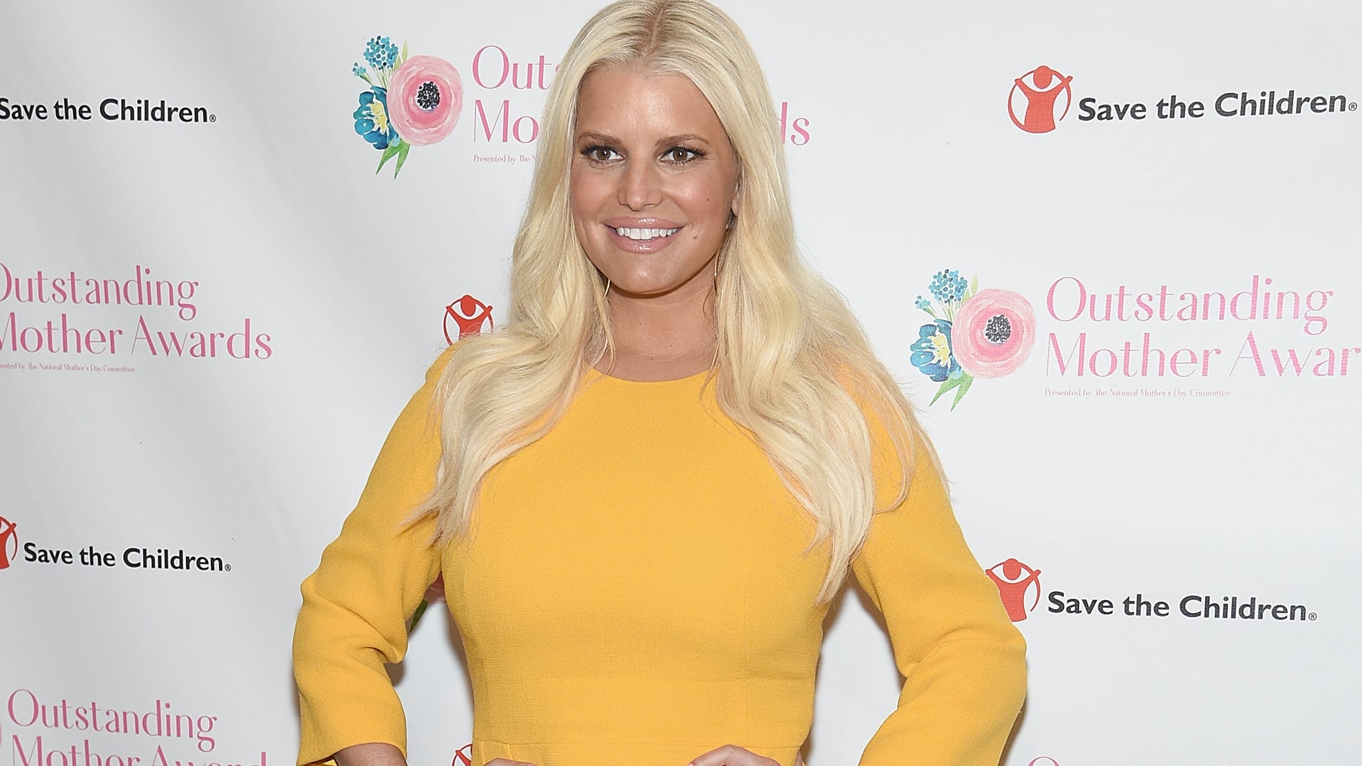 Jessica Simpson wears Christmas onesie a year after 100-pound weight loss