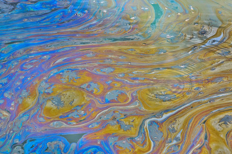 Tests completed by officials in Genesee County on Friday have traced the source of an oil- based spill on the Flint River back to a local chemical company.