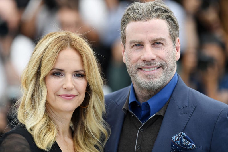 Kelly Preston and John Travolta attend the photocall for "Rendezvous With John Travolta - Gotti"
