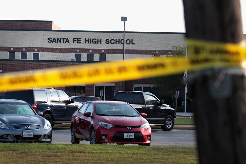 Crime scene tape is stretched across the front of Santa Fe High School on May 19, 2018 in Santa Fe, Texas.