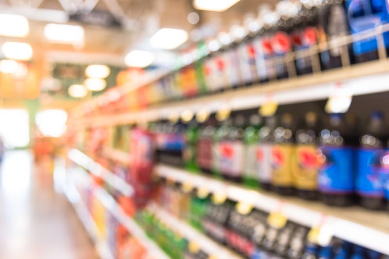 The soda aisle at a grocery store.