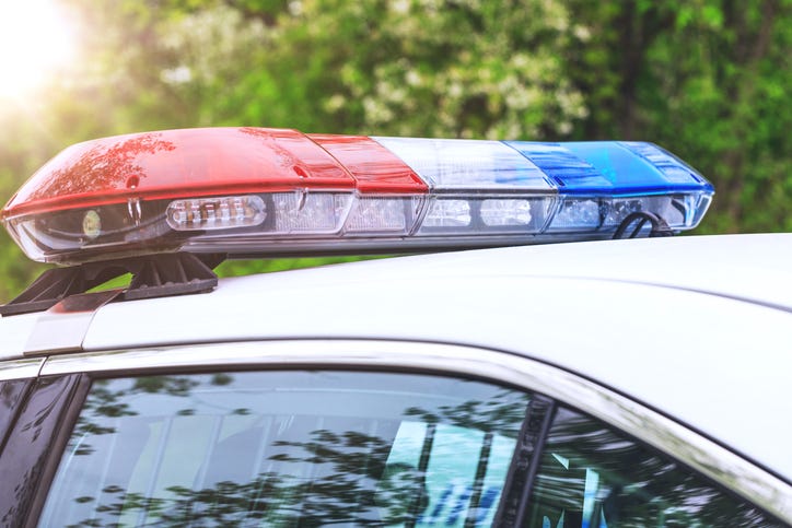 police car with lights activated 