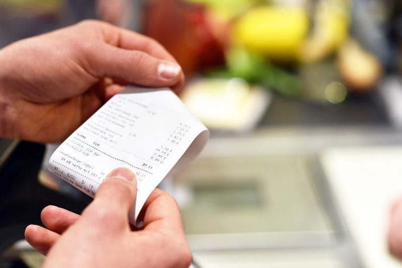 Grocery receipt at the cash register.