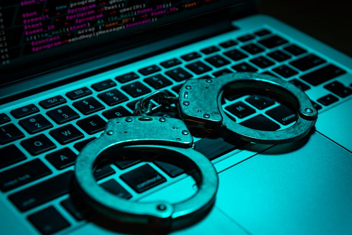 handcuffs on a keyboard