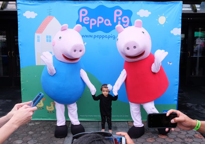 Children pose with Peppa Pig during GOOD+ Foundation's 2018 NY Bash sponsored by Hearst on May 31, 2018 in New York City