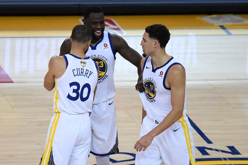 Steph Curry, Draymond Green and Klay Thompson
