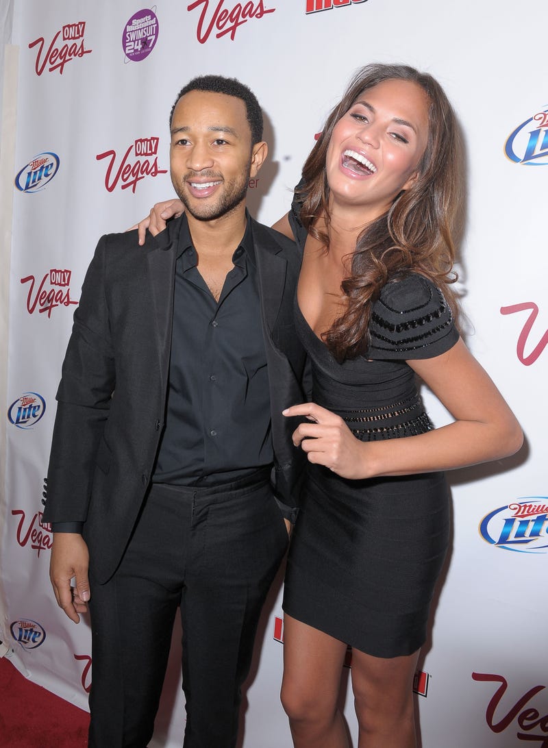 john legend and chrissy teigen on red carpet