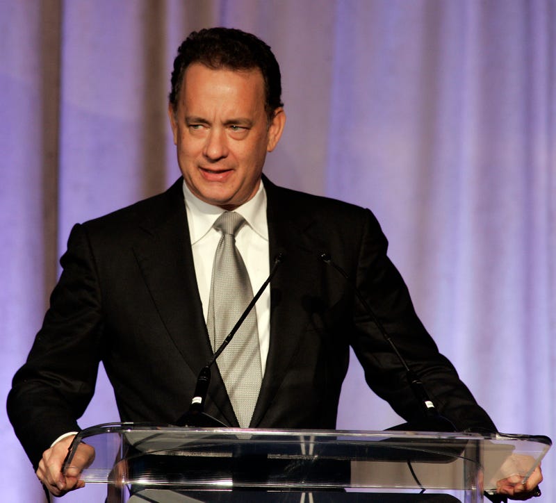 Actor Tom Hanks pauses as he introduces Captain James A. Lovell Jr. who is receiving the Lincoln Leadership prize during a dinner honoring contemporary world leaders February 11, 2010 in Chicago, Illinois. Lovell is celebrating the 40th anniversary of piloting the Apollo 13 mission. 
