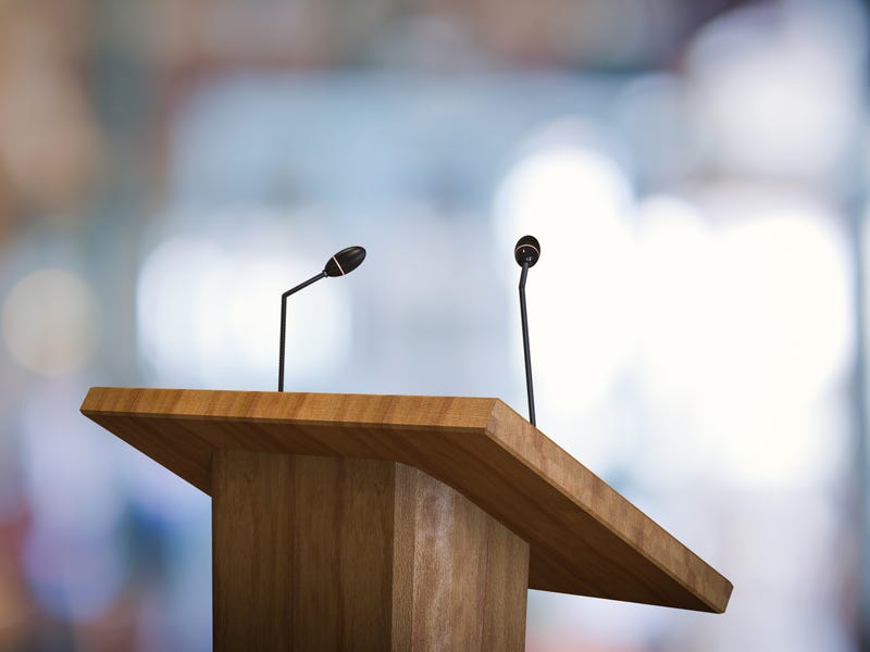 Defiant priest removed from ministry to speak in Beloit