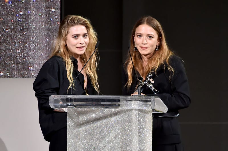 esigners Ashley Olsen and Mary-Kate Olsen accept the 2018 CFDA Accessories Designer of The Year award during the 2018 CFDA Fashion Awards at Brooklyn Museum.