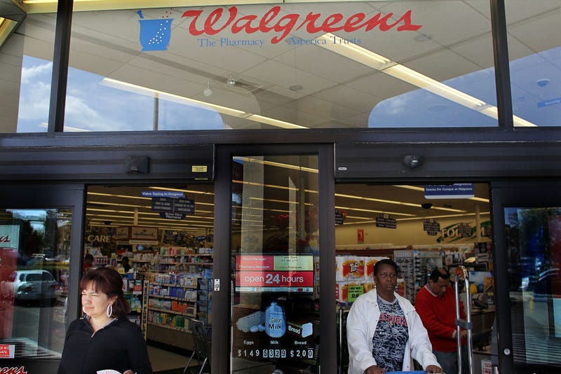 Customers walk out of a Walgreens store on February 17, 2010 in Homestead, Florida.